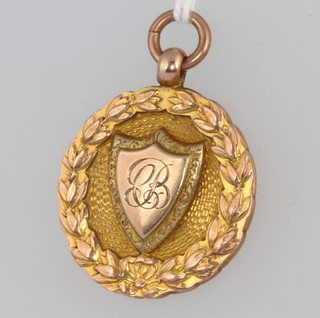 A 9ct yellow gold sports fob 9.1 grams 