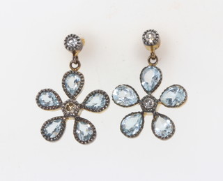 A pair of silver gilt topaz and diamond daisy style earrings 