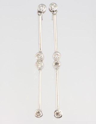 A pair of 18ct white gold 4 stone diamond drop earrings, approx. 0.8ct, 55mm 