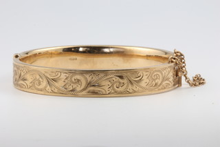 A 9ct yellow gold hinged bangle 15.6 grams 