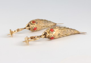 A pair of 9ct yellow gold articulated fish earrings with coral eyes 3.5 grams