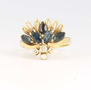 An 18ct yellow gold sapphire and diamond ring, size m 5 grams