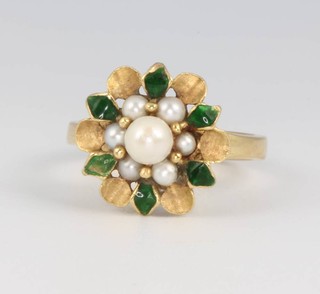 An 18ct yellow gold pearl and enamelled floral ring size N, 6.2 grams