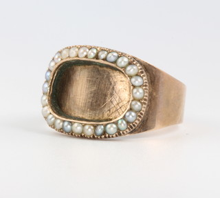 A 19th Century 9ct yellow gold seed pearl memorial ring, size T, 3.9 grams