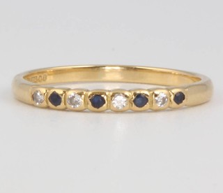 An 18ct yellow gold sapphire and diamond ring size N, 1.7 grams