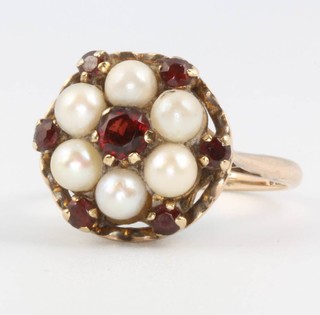 A 9ct yellow gold garnet and pearl ring size L 1/2, 4.5 grams 