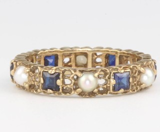 A 9ct yellow gold sapphire and seed pearl ring, size M, 2.3 grams