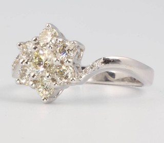 An 18ct white gold 7 stone diamond cluster ring approx. 1ct, size N 