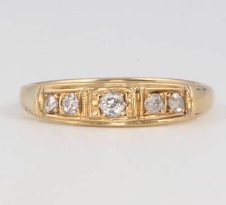 A 15ct yellow gold 5 stone diamond ring, size N, 2.4 grams 