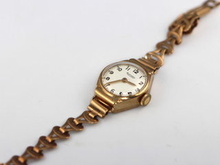 A lady's 9ct yellow gold Rotary wristwatch on a ditto bracelet