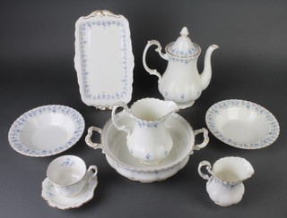 A Royal Albert Memory Lane tea, coffee and dinner service comprising milk jug, 8 tea cups (3 seconds), 8 saucers, 7 dinner plates (6 seconds), 7 dessert bowls (1 second), 2 shell shaped dishes, 5 two handled bowls (4 seconds), 6 saucers (1 second and 1 is a/f), 8 small plates (6 seconds), 8 medium plates (6 seconds), a sugar bowl (a/f) and the following which are all seconds - teapot, cream jug, meat plate, sauce boat stand, tureen (no lid), 2 soup bowls, 2 vegetable dishes, a salad bowl, a sandwich bowl, serving plate