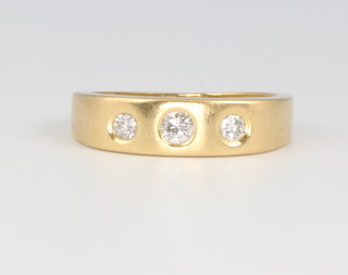 An 18ct yellow gold 3 stone diamond ring approx. 0.3ct, 3.2 grams, size K