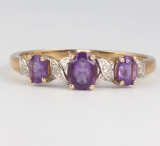 A 9ct yellow gold amethyst and diamond ring size P, 1.5 grams