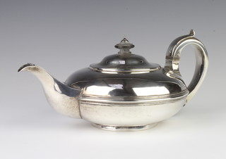A George IV melon shaped teapot with ebony mounts London 1828, gross 595 grams 
