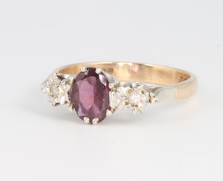 A 9ct yellow gold garnet and diamond ring, size L, 2.5 grams