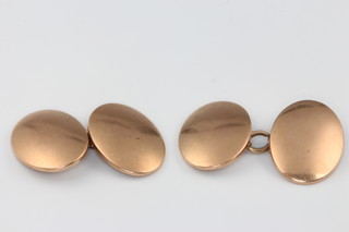 A pair of 10ct yellow gold oval cufflinks, 8 grams