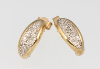 A pair of 9ct yellow gold diamond set earrings, 2.5 grams