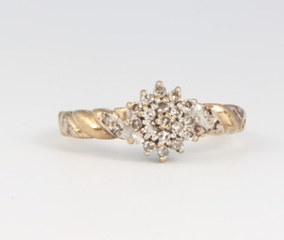 A 9ct yellow gold diamond cluster ring size P, 2.4 grams 