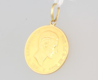 An 1881 10 pesetas gold coin 