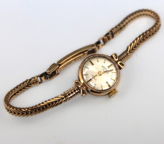 A lady's 9ct yellow gold Rotary wristwatch and strap, gross weight 13.3 grams 