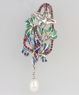 A silver Art Nouveau style ruby, enamel and pearl brooch (1 stone missing) 
