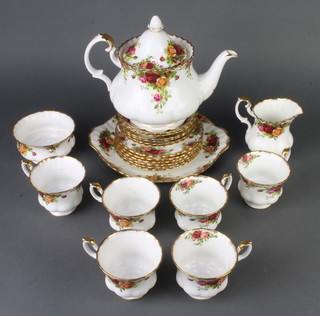 A Royal Albert Old Country Roses part tea set comprising teapot, 6 tea cups, 6 saucers, 6 small plates, a sandwich plate, milk jug and sugar bowl 