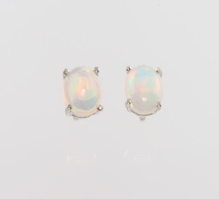 A pair of Ethiopian opal ear studs
