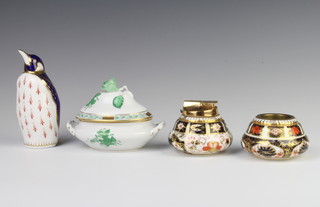 A Royal Crown Derby Imari pattern table cigarette lighter, a ditto base, ditto penguin paperweight (stuck beak) and a Herend pot and cover 