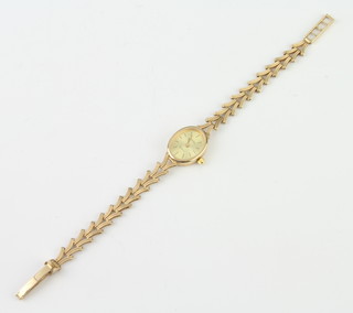A lady's 9ct yellow gold Roamer quartz wristwatch gross weight 13 grams 