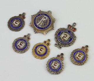 Seven silver and enamelled sports fobs 147 grams 