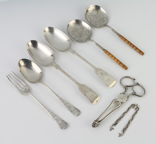 A pair of Georgian silver scissor action sugar tongs and minor cutlery, 221 grams