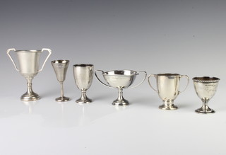 A silver trophy cup Birmingham 1954 and 5 other small trophy cups 277 grams