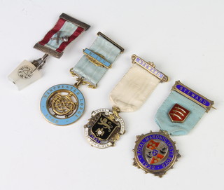 A silver gilt centenary jewel Manchester Lodge 1768, 2 silver gilt enamelled charity jewels and a mark jewel 