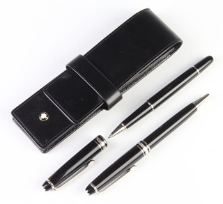 A Mont Blanc ballpoint pen and a ditto rollerball pen, contained in a leather pouch 