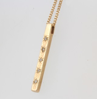 A 9ct yellow gold diamond set pendant and chain 4.7 grams 