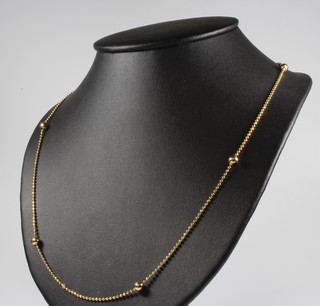 An 18ct yellow gold ball link chain 8.7 grams, 59cm 