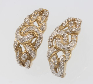 A pair of 9ct yellow gold half hoop earrings 4.9 grams 