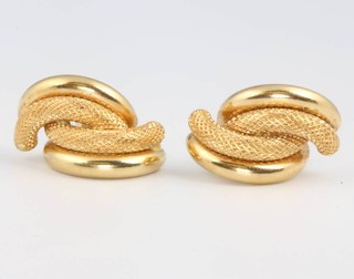 A pair of 18ct yellow gold half hoop earrings 5.3 grams