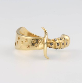 An 18ct yellow gold gem set dagger ring 6.6 grams, size N 1/2