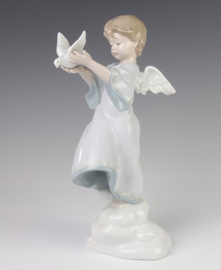 A Lladro figure of an angel and dove 8533 27cm 