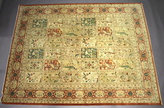 A Caucasian style Persian rug with 36 panels to the centre, each with animal or floral scene within a multi row border 362cm x 281cm 