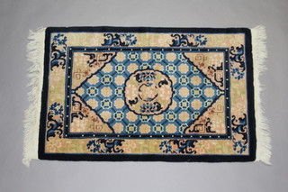 A blue and peach ground Chinese rug 195cm x 60cm 