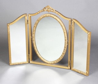 A triple plate dressing table mirror contained in a decorative gilt frame 64cm h x 81cm w 