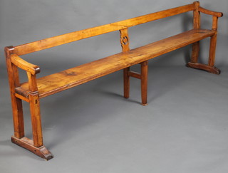 A Continental fruitwood bench raised on 6 square supports with solid seat and bar back, 75cm h x 250cm w x 34cm d 
