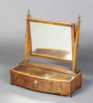 A 19th Century inlaid and crossbanded mahogany rectangular plate dressing table mirror, raised on a bow front base fitted 1 long and 2 short drawers, on bracket feet 49cm h x 46cm w x 22cm d 