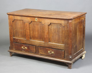 A 17th/18th Century mule chest with crossbanded hinged top and iron handle, the base fitted 2 drawers, raised on bracket feet 79cm h x 125cm w x 56cm d 