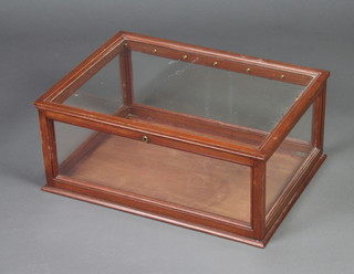 A rectangular mahogany and glass table top display cabinet (key in office) 23cm h  x 54cm w x 39cm d  