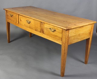An 18th/19th Century Continental fruitwood table fitted 1 long and 2 short drawers with brass ring drop handles, raised on square tapered supports 76cm h x 175cm w x 70cm d 
