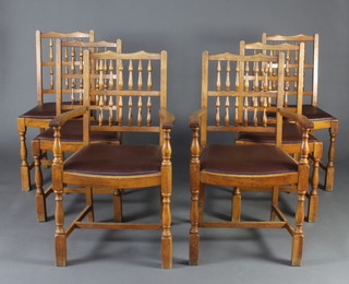 A set of 6 elm spindle back dining chairs with upholstered drop in seats - 2 carvers, 4 standard 