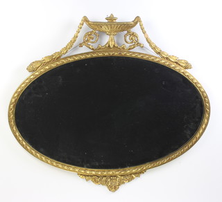 A Georgian style oval plate mirror contained in a decorative gilt frame surmounted by a lidded urn with swag decoration 70cm h x 81cm w